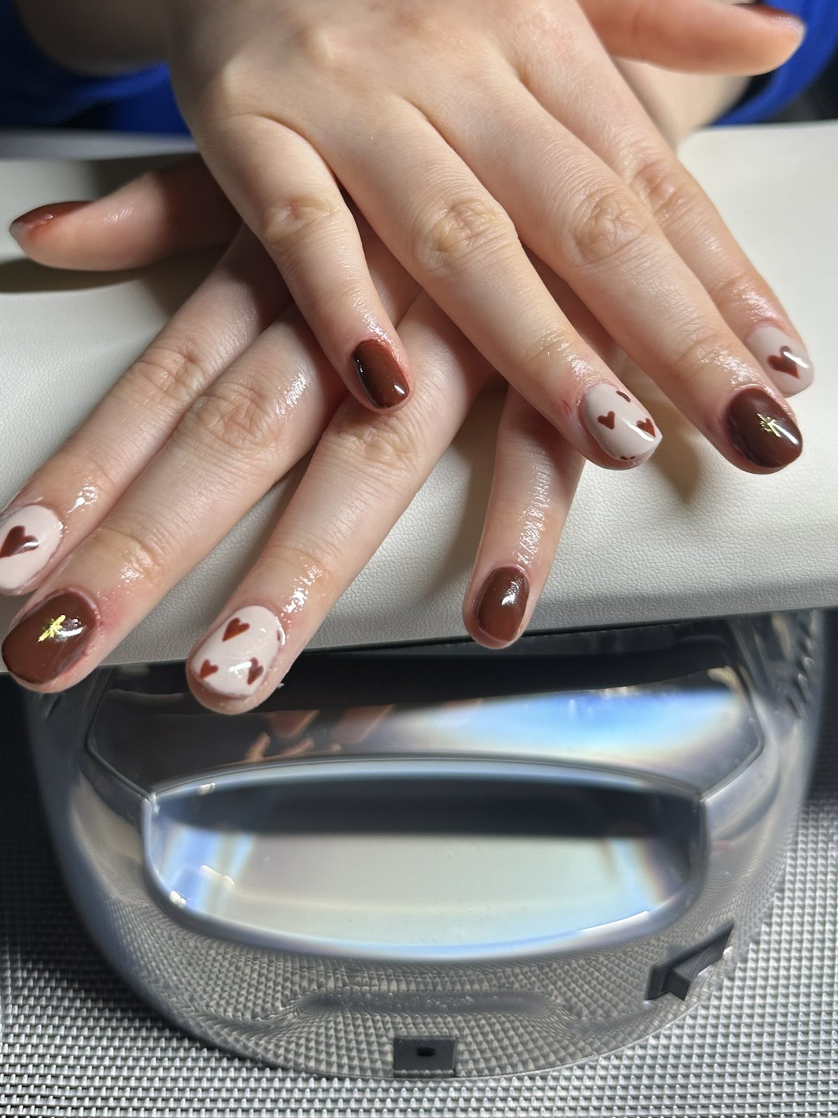 Chocolate brown acrylic set with hand-painted heart accent nails