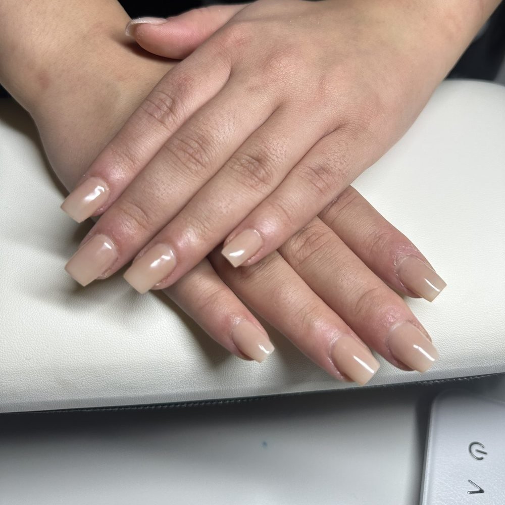 Glossy nude square acrylic set with a clean natural finish